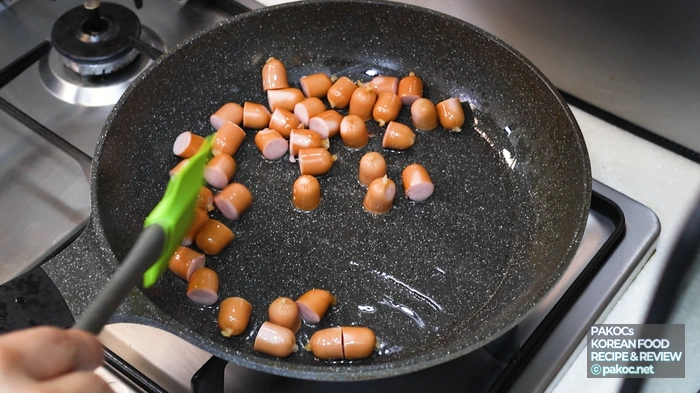 Stir-frying Vienna sausages