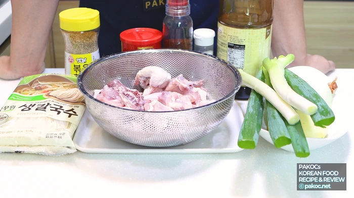 Preparing dipping sauce ingredients: toasted sesame seeds