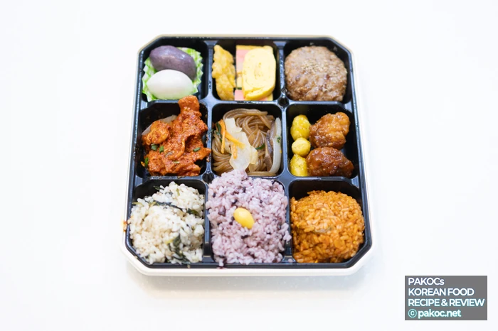Lonchera con cerdo picante, dakgalbi y pollo frito